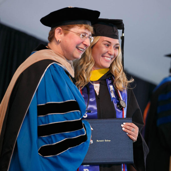 President Drugovich with new graduate at Commencement