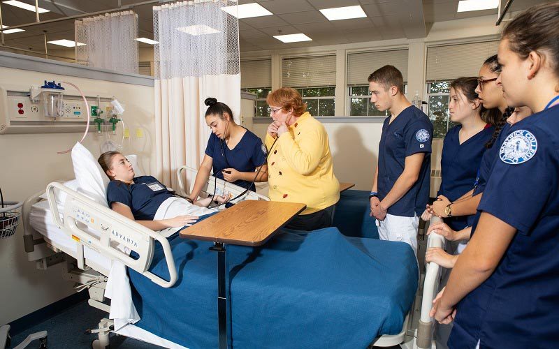 Hartwick College Nursing students working in simulation lab