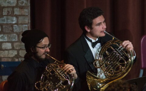 Hartwick students performing with French horns