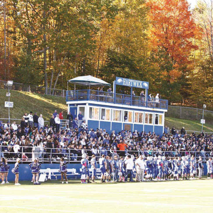 Crowd in stands of Elmore Field during True Blue Weekend