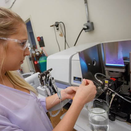 Hartwick College student in chemistry lab