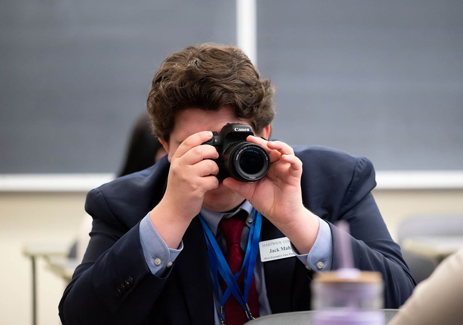 Hartwick College student taking photographs