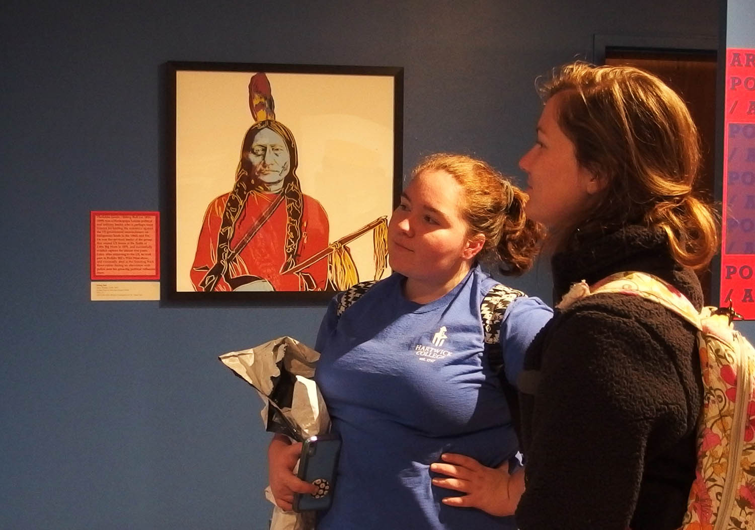 Hartwick College students in Yager Museum of Art & Culture with Andy Warhol Native American print in background