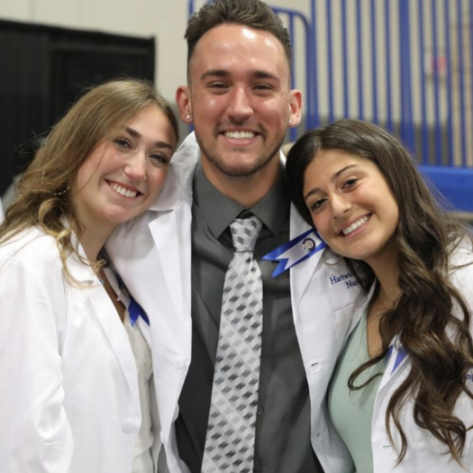 Hartwick College nursing graduates following pinning ceremony 2023