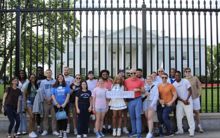 Hartwick College students, faculty and alumni in front of White House in Washington DC