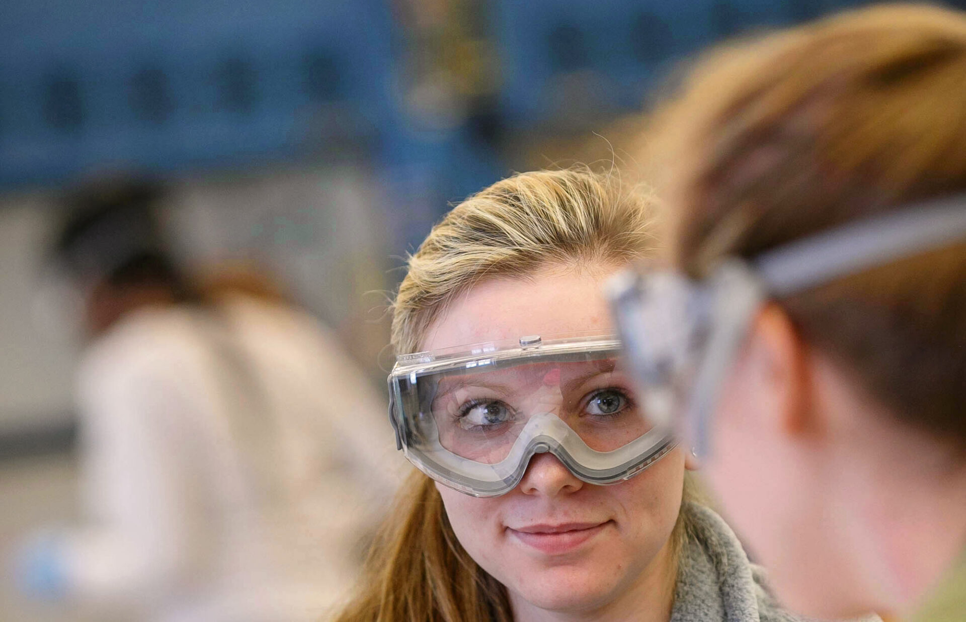 Hartwick College students wearing goggles in Chemistry Lab