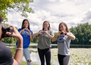 ladies posing with hearts