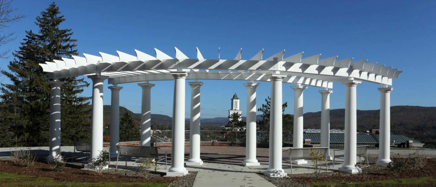 View of Yager Hall bell tower through the pergola on Founders' Way