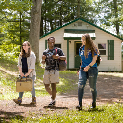Hartwick students walking at Pine Lake