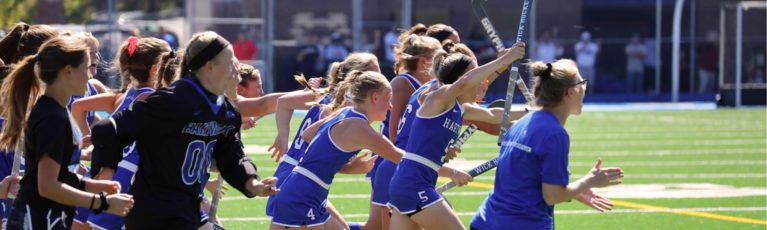 lacrosse players running