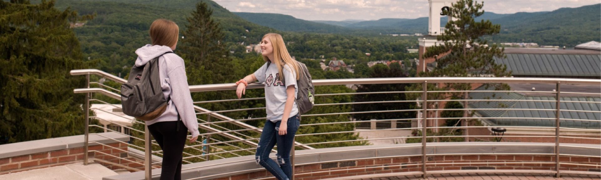 students standing on campus