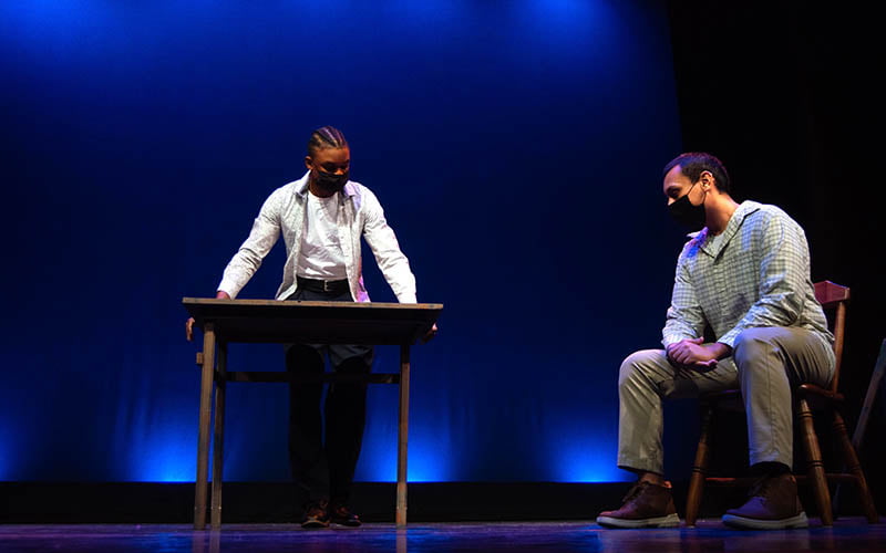 Hartwick students on stage during performance of ENOUGH