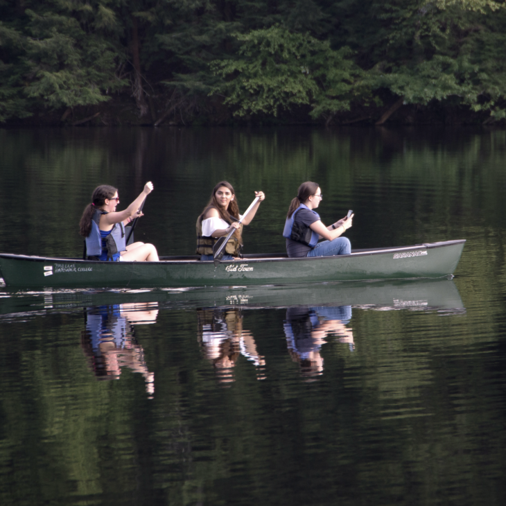 Hartwick students in canoe on Pine Lake