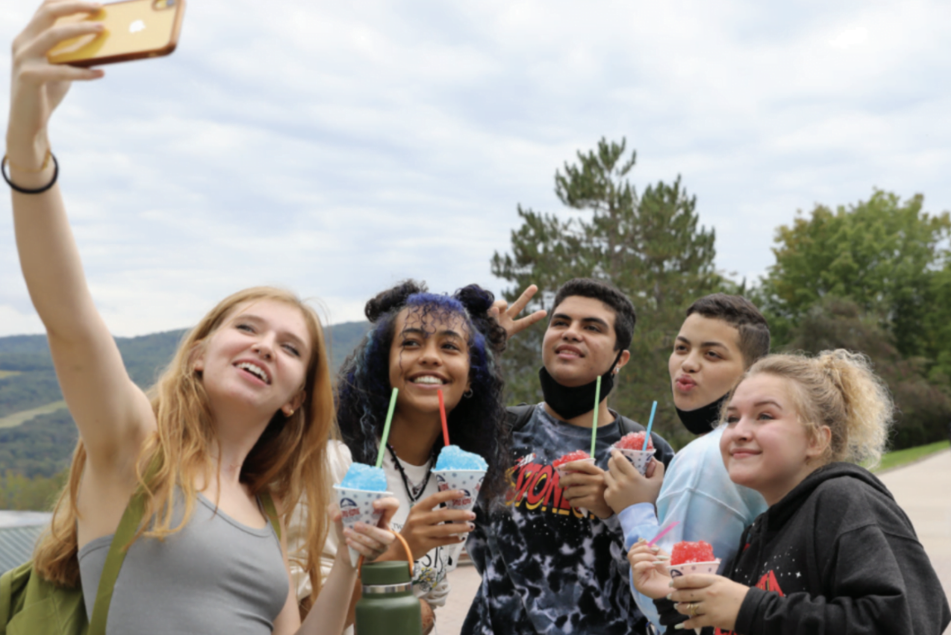 Hartwick students taking a selfie on Founders' Way