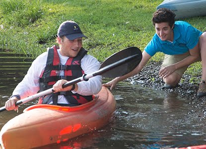 Hartwick student in kayak at Pine Lake