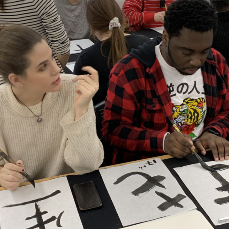 Hartwick students learning Janese calligraphy in Tokyo, Japan
