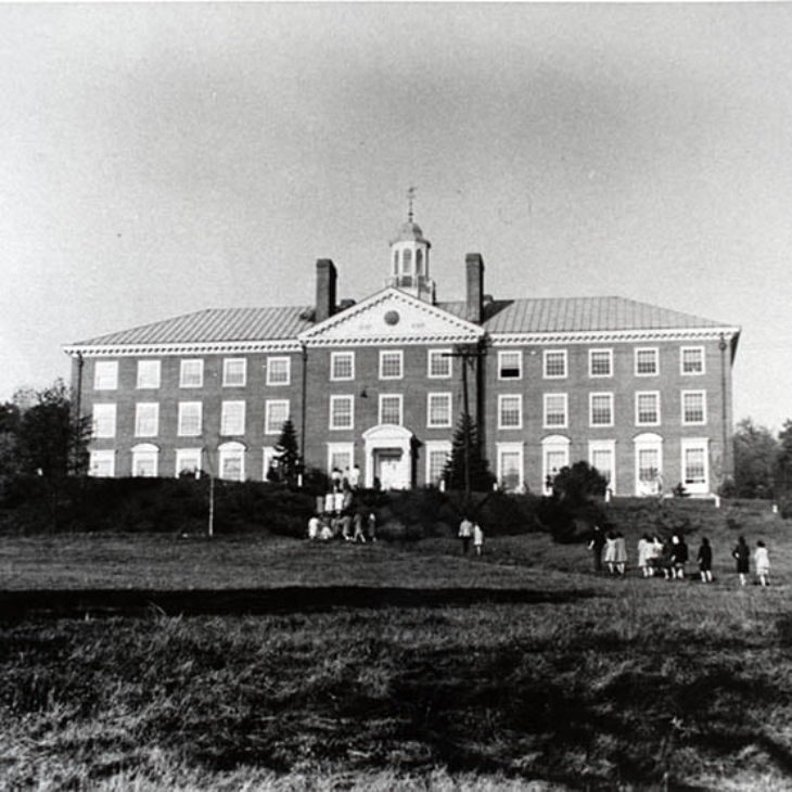 Hartwick students walking up hill to science hall