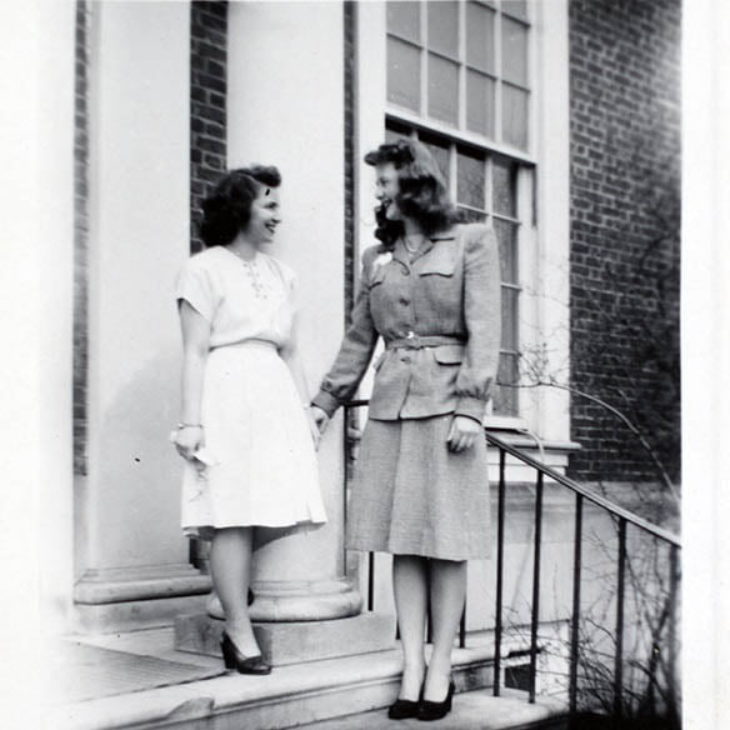 Two Hartwick College Cadet Nurses on Bresee Hall front steps