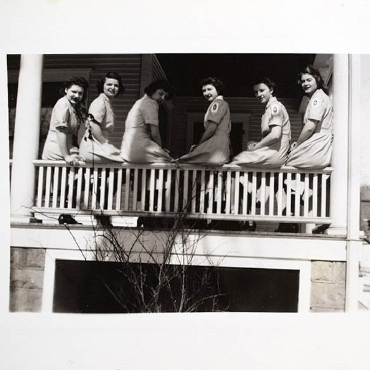 Hartwick College Cadet Nursing Students on porch of home in Oneonta, NY