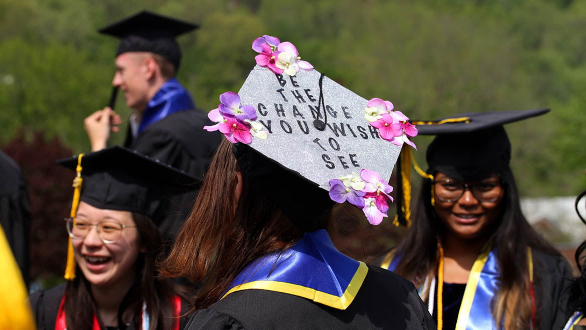 Hartwick College Graduates Last Walk in cap and gown