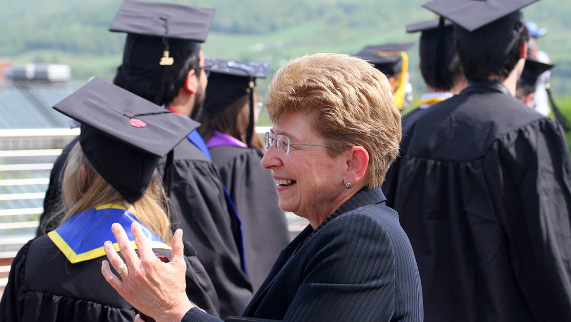 President Margaret L. Drugovich cheers on Hartwick College Graduates during Last Walk