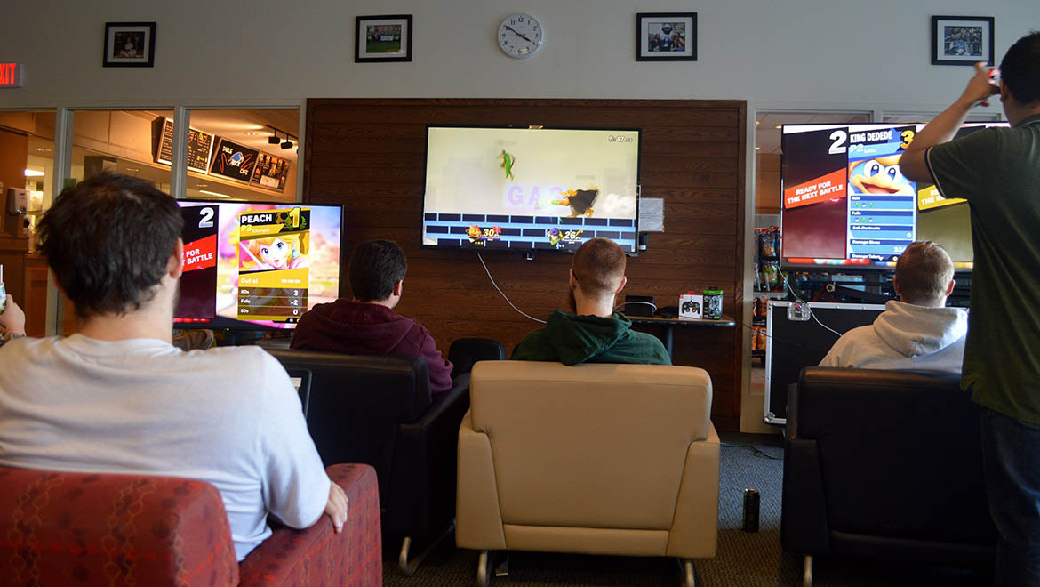 Hartwick students during an Esports Tournament in Stack Lounge