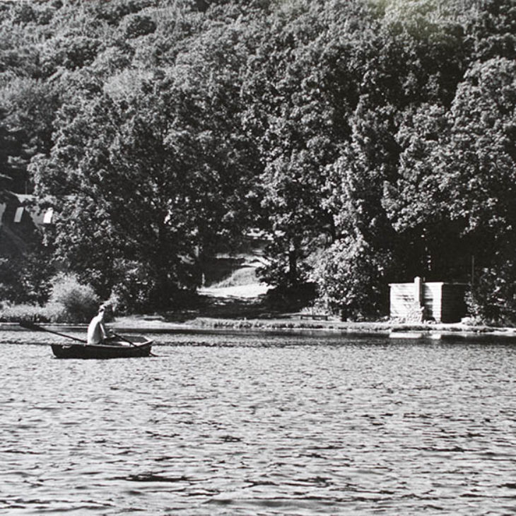 Student in boat at Hartwick College's Pine Lake