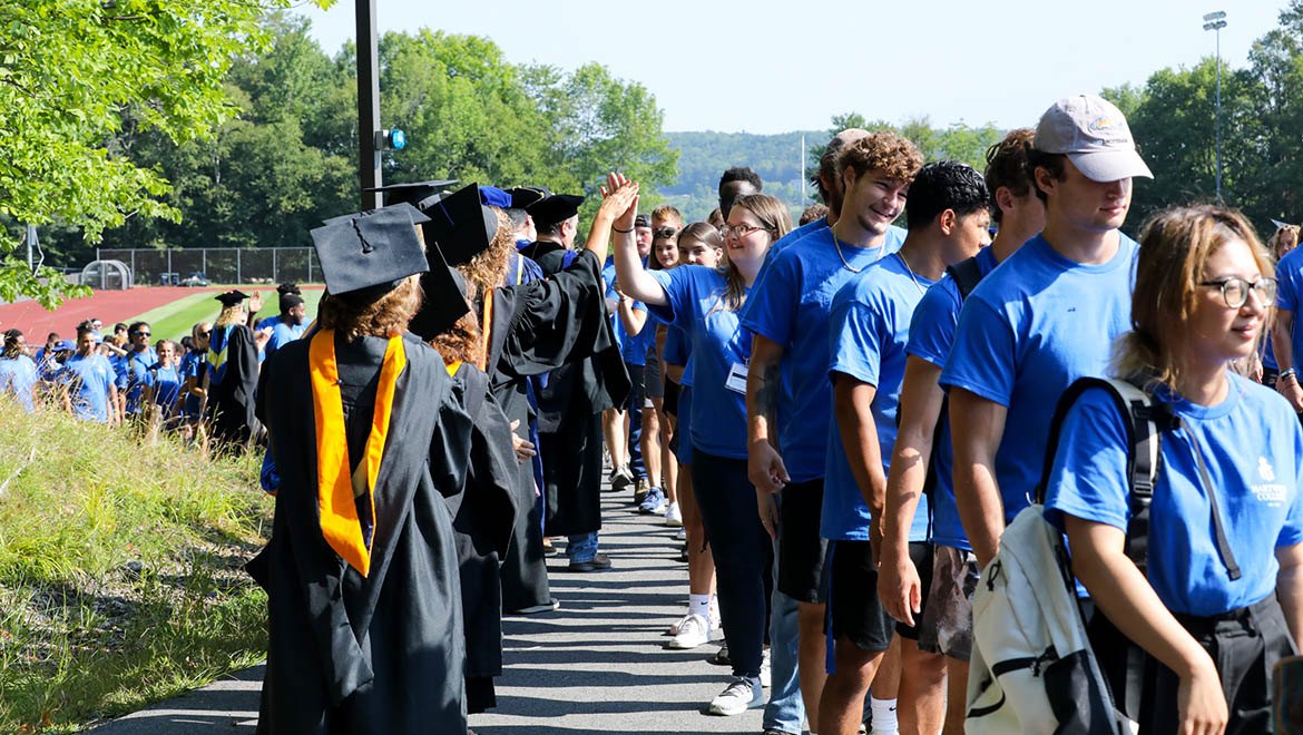 Members of the Hartwick Class of 2026 being greeted by faculty before Opening Convocation Ceremony