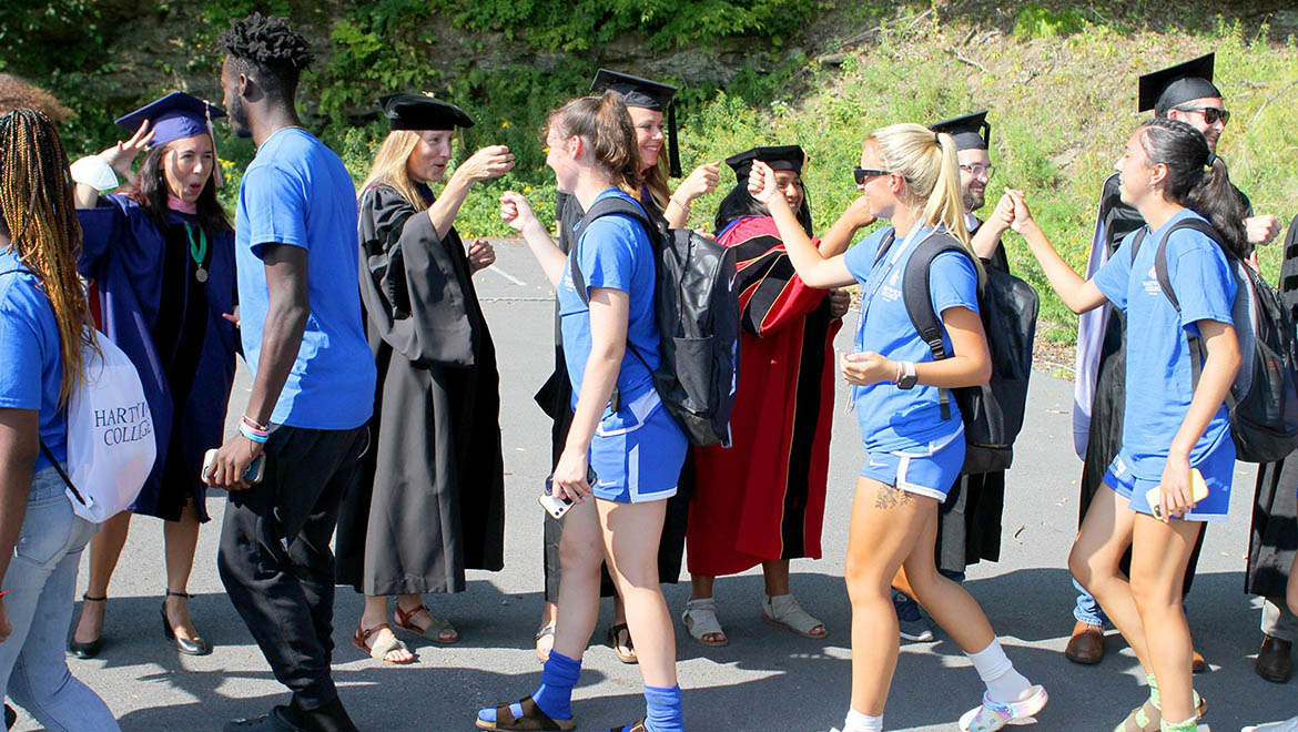 Hartwick students of the class of 2026 are welcomed by faculty before Opening Convocation