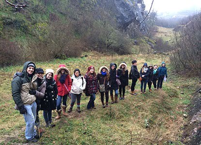 Hartwick College students in field in Hungary