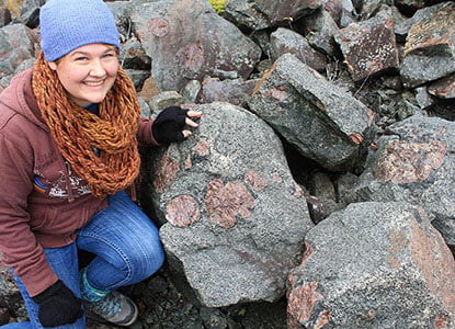 Hartwick College geology student in field