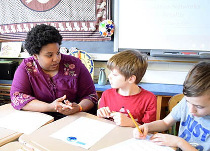 Hartwick College education student in elementary school classroom