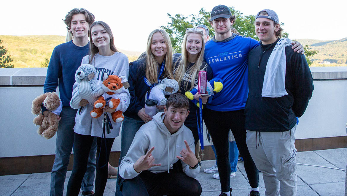 Hartwick students with stuff-a-bear bears during Fall 2022 True Blue Weekend