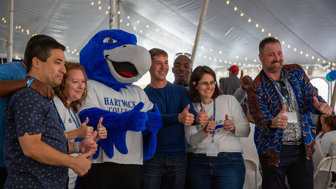 Hartwick College alumni with Swoop during Fall 2022 True Blue Weekend