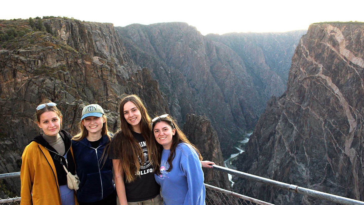 Hartwick geology students at Painted Wall Overlook at sunset in Black Canyon of the Gunnison National Park