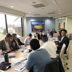 Hartwick students working in conference room during HAWK Career HOP
