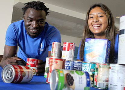 Hartwick students with donated canned food
