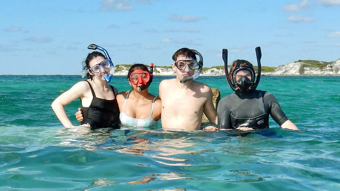 Hartwick College students snorkeling in the Bahamas