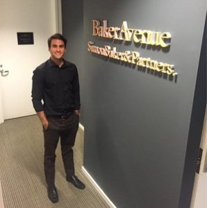 2016 Baker-Simpson Fellow Mau Fornerino working at Baker Avenue Asset Management