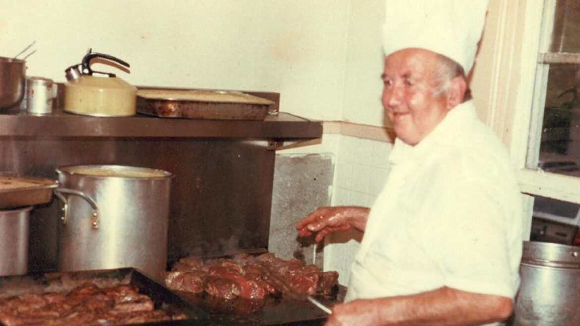 Chef in kitchen cooking