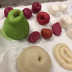 Hartwick College art exhibition: sugar paste small fruits, pearls, and cameo medallions