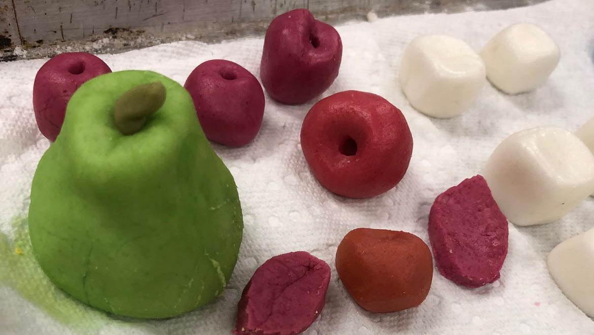 Hartwick College art exhibition: sugar paste small fruits, pearls, and cameo medallions