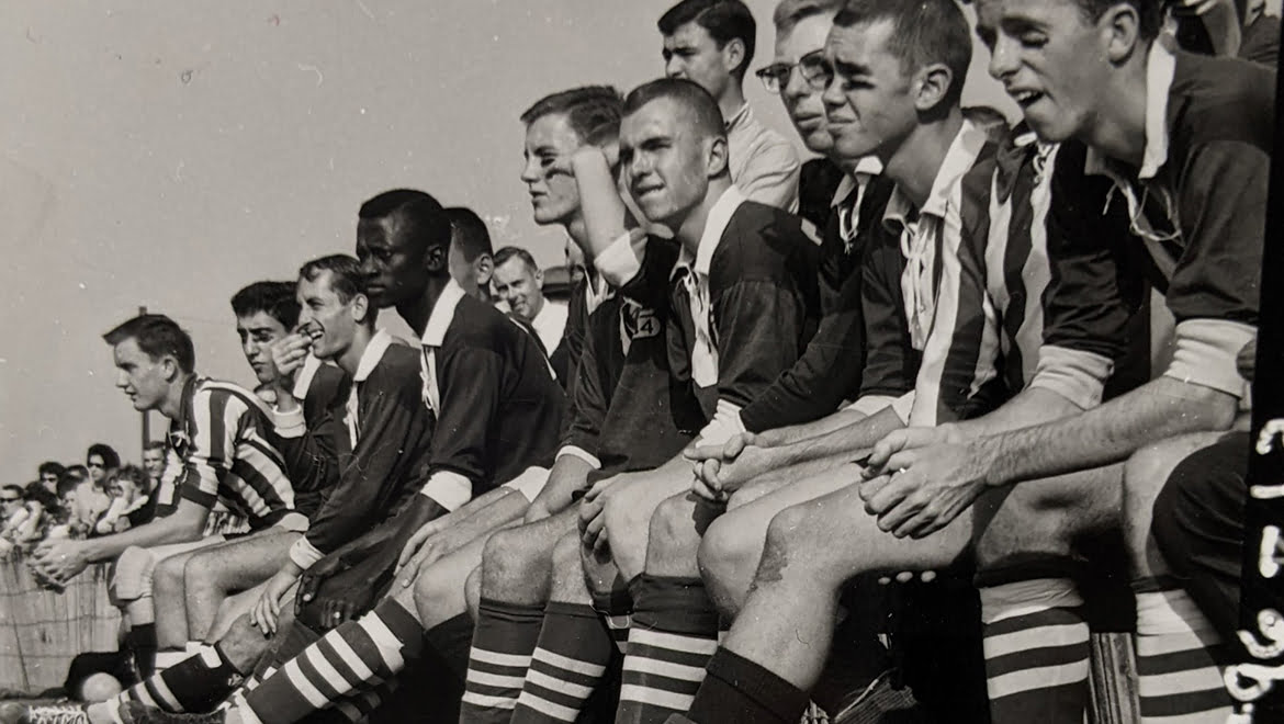 1963 Hartwick College soccer team players on bench