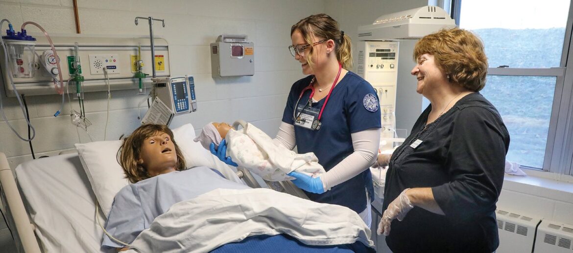 Hartwick College student working with Professor Melody Best in Simulation Lab