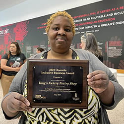 Allison King of King's Kakery with Oneonta Inclusive Business Award, awarded by Hartwick College and SUNY Oneonta