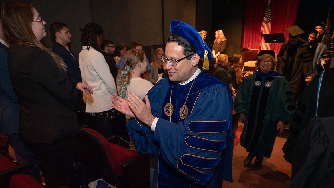 President Darren Reisberg during Honors Convocation recessional