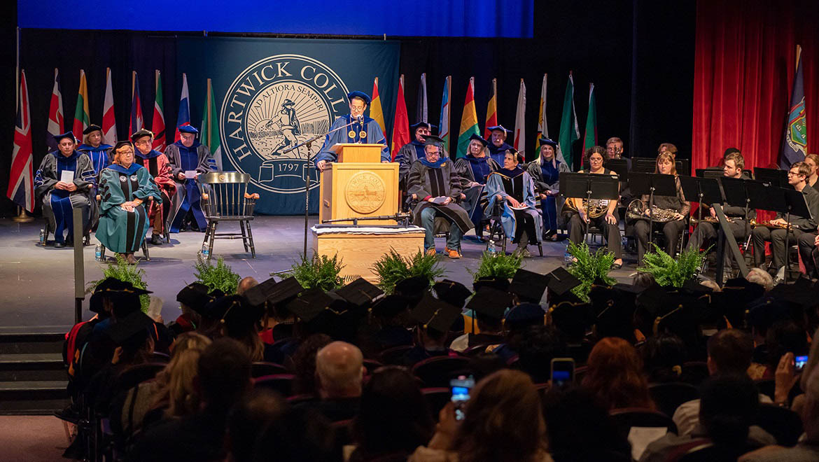 President Darren Reisberg making opening remarks at Honors Convocation, May 3, 2023