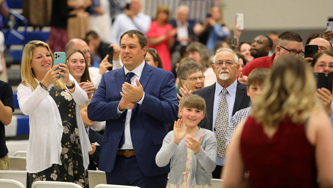 Family and friends clapping during Class of 2023 Nursing Pinning Ceremony in Lambros Arena