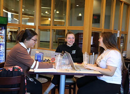 Hartwick students relaxing and socializing in John Christopher's Cafe