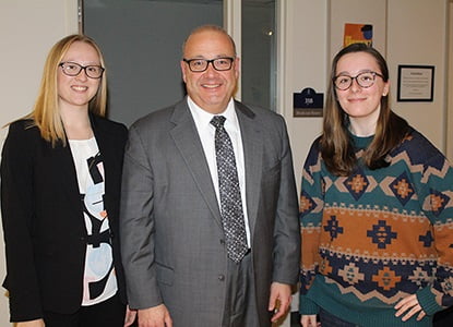 Hartwick students with visiting lawyer for campus networking experiences